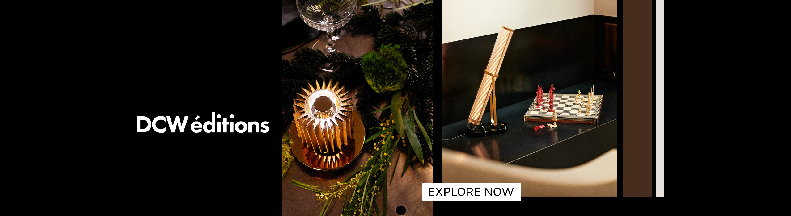 Elegant DCW éditions lighting displayed on a festive table and beside a chessboard, featuring modern sculptural lamps in warm tones with text ‘Explore Now’.